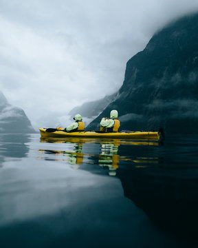 Two people sailing