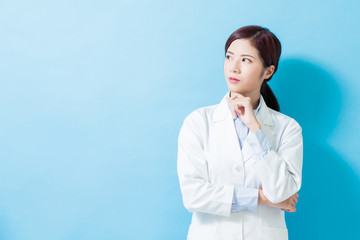 woman dentist look somewhere