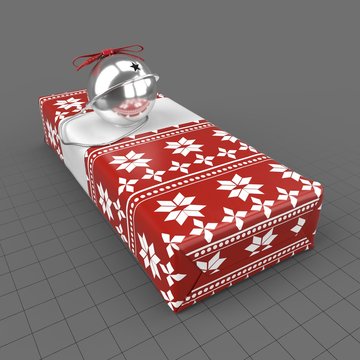 Wrapped holiday present with bell