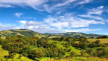 Fototapeta na wymiar Perfect sunny day over the Monteverde hills and coffee plantations. Costa rica