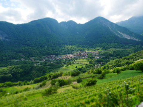 Tilt shift image of mountain village in italy