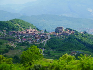 Tilt shift image of mountain village in italy