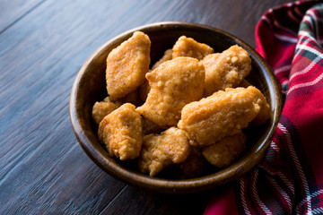 Boneless Chicken Wings in Wooden Bowl / Nuggets