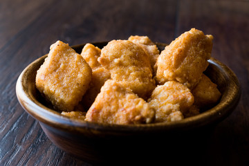 Boneless Chicken Wings in Wooden Bowl / Nuggets