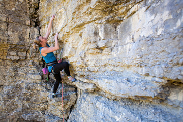 rock climber on a rock.
