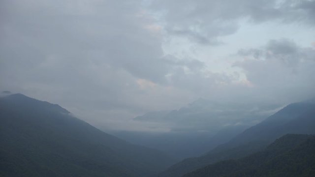 Mountain peaks with blue sky and dramatic clouds, Sochi, Roza Khutor, 2018