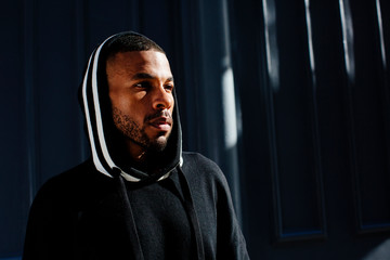 Portrait of young man in hoodie