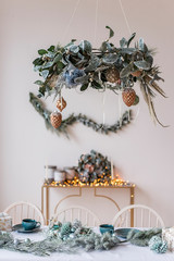 New Year's and Christmas! Beautiful decorations for Christmas, fireplace, tree, toys, gifts, cones, festive lights.