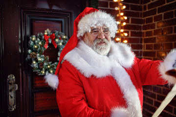 Smiling Santa Claus reading wishes