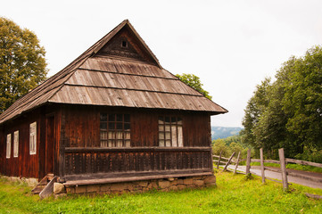 Old wooden village house in the mountains (concept ethnic)