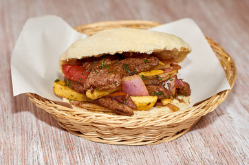 homemade meat sandwich, lomo saltado