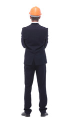 in full growth. a serious businessman in a protective helmet