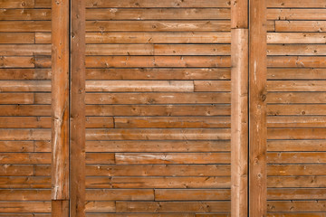 Rural wooden wall texture background. Facade of a log house, copy space. Wooden texture background Wall of blockhouse