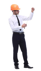 in full growth. young architect with yellow tape measure