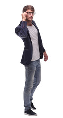 in full growth.smiling business man with glasses.