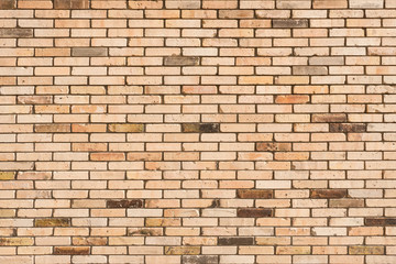 Obraz premium Detailed old red brick wall background photo texture. Faded brick wall background. Colored bricks facade.