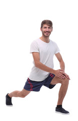 Obraz premium Full length.active male performs squats with straight arms.