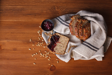 Fototapeta na wymiar Overhead Sliced multigrain bread with jam