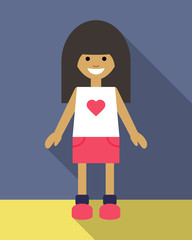 Little girl in a red skirt and a white t-shirt with a heart.  Smiling child.
