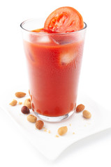 Fresh tomato juice isolated on white background