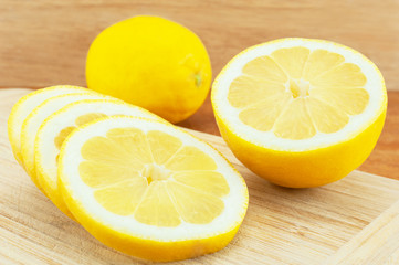 Fresh lemon on wooden table