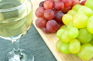Grape and wine on the table