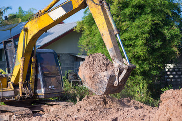 Close-up excavator of construction site