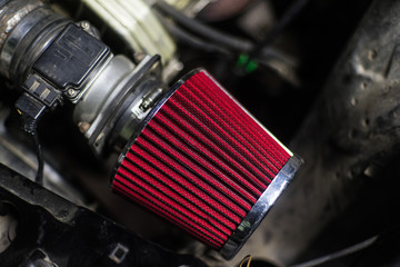 High performance red air filter of sport car - obrazy, fototapety, plakaty