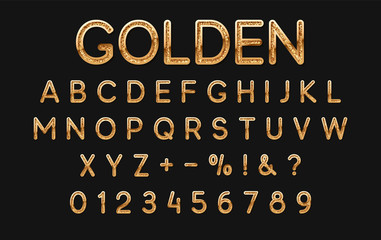 Gold font and alphabet. Golden letters and numbers on black background