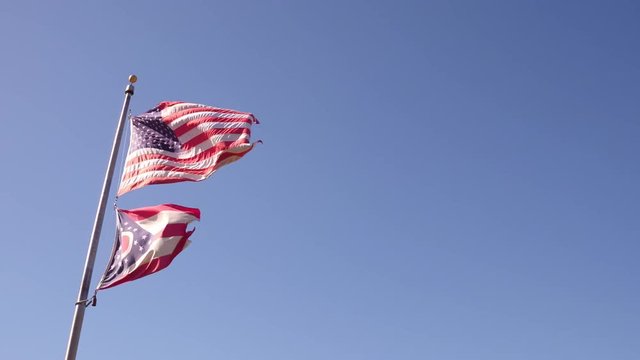 United States and Ohio State flag waving in wind 4k