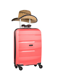 Plastic suitcase with hat and sunglasses isolated on white background