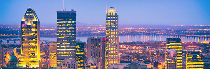 Montreal city skyline at night banner panorama header in Quebec, Canada