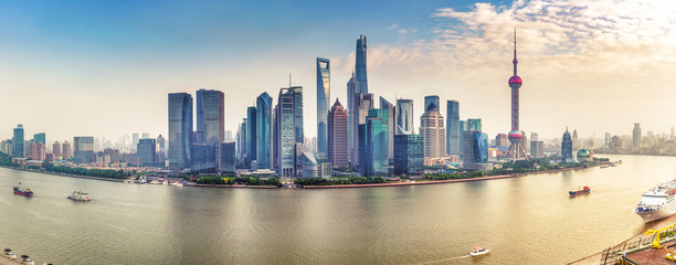 Aerial panorama view on Shanghai, China. Beautiful daytime skyline with skyscrapers and the Hunapu river.