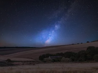 Fototapeten Vibrant Milky Way composite image over landscape of English countryside © veneratio