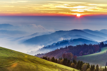 Dramatic sunset over rolling hills of the Black forest in Germany. Scenic travel background. - 231286953