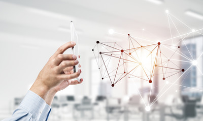 Business and technology concept with networking grid and man usi