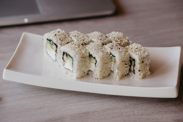 Delivery of Japanese cuisine. Registration of delivery on the website by laptop