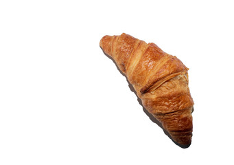 closeup fresh baked butter croissant isolated on white background