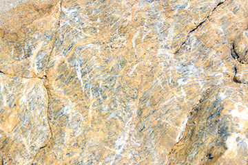 Yellow and white sedimentary rock surface texture horizontal