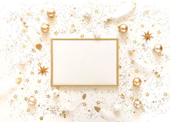 Christmas composition background pattern from gold and white Christmas decorations and frame mock up . Xmas of New Year's Christmas balls. Winter holiday concept.Flat lay. Top view. Copy space