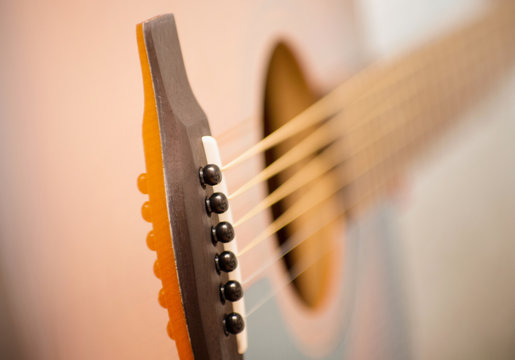 Acoustic guitar with very shallow depth of field
