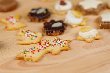 traditional homemade german christmas cookies on wooden board