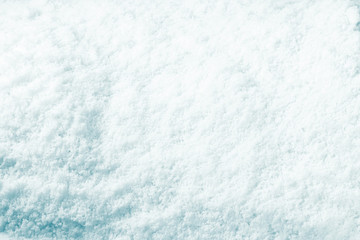 Snow background. Surface of pure snow texture.