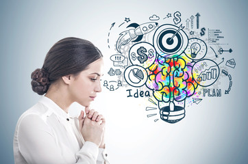 Pensive young businesswoman, business idea