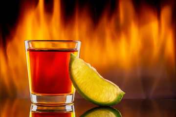 tequila shot glass and fire