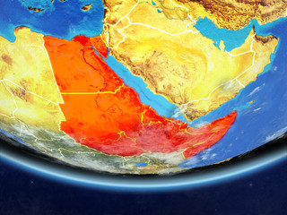 Northeast Africa on realistic model of planet Earth with country borders and very detailed planet surface and clouds.