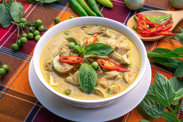Thai food chicken green curry on table background ,Green Curry With Chicken
