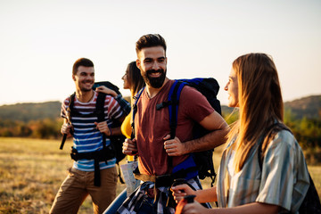 group of friends having fun in the park