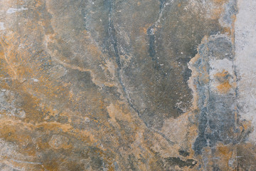 Dark stone or slate wall.Grunge background. Gray broun stone background