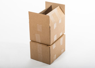 Two cardboard boxes and one opened